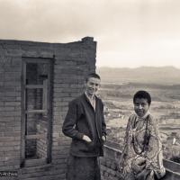 Click to view in our Image Gallery (15142_ng.psd) Anila Ann and Max Mathews, two early students of the Lamas, on the roof of Kopan as the second floor is in progress, 1972.