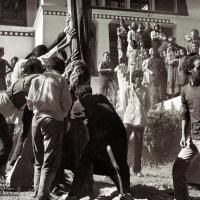 Click to view in our Image Gallery (15155_ng.psd) Raising the prayer flag pole at Kopan Monastery, Nepal, 1972. In attendance are some Mount Everest Center monks and students from the third Kopan course. Nick Ribush, an early student of the Lamas, is at the front right.