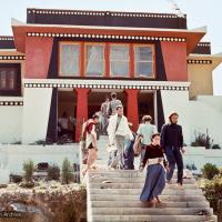 (15167_sl.psd) Front view of Kopan, 1972, with students on the steps. Kopan Monastery, built in Nepal, is the first major teaching center founded by Lama Yeshe and Lama Zopa Rinpoche.