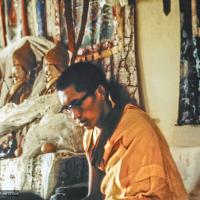 Lama Zopa Rinpoche teaching, Fourth Meditation Course, Kopan Monastery, Nepal, 1973. Photo by Lynda Millspaugh.