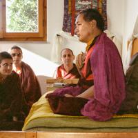 Click to view in our Image Gallery (15235_ng.psd) Lama Yeshe addressing western monks and nuns at Istituto Lama Tsongkhapa, Italy, 1983. Nick Ribush is directly in the center, back wall, Wongmo Thubten (Feather Meston) is in the foreground, left. Photos donated by Merry Colony.