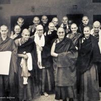 (15367_ud-2.psd) Newly ordained monks and nuns have an audience with H.H. Dalai Lama, Dharamsala, India, March 12, 1975. In the front row is Jhampa Zangpo (Mark Shaneman), Suzanne Lee (Jampa Chozom), Piero Cerri, Dieter Kratzer, Thubten Chokey, HH Dalai Lama, Gareth Sparham, Bonnie Rothenberg, John Feuille. Back row is Steve Malasky (Steve Pearl), Nick Ribush, Thubten Pende (Jim Dougherty), Jeffery Webster, Bruno LeGuevel, Jampa Konchog (Yogi), and Bonnie Rothenberg.