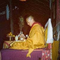 (15595_pr.tif) Lama Zopa Rinpoche doing a mandala offering. Photo from the 8th Meditation Course at Kopan Monastery, Nepal, 1975.