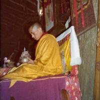 (15600_pr.tif) Lama Zopa Rinpoche doing a mandala offering. Photo from the 8th Meditation Course at Kopan Monastery, Nepal, 1975.