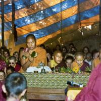 (15601_pr-2.psd) Lama Yeshe doing puja. Next to Lama Yeshe is Gelek Gyatso, Charok Lama (Tenzin Dorje), and Thubten Zopa (Tenzin Norbu). On the left is Thubten Pemo (Linda Grossman), Aleca Moriatis, and Nicole Couture. Photo from the 8th Meditation Course at Kopan Monastery, Nepal, 1975.