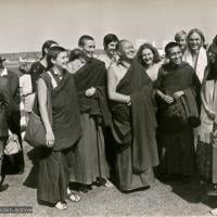 (15839_pr.psd) The lamas arriving at Maroochydore airport, Queensland, Australia, 1974. Left to right: Yeshe Khadro, Anila Ann, Lama Yeshe, Ellie Pratt, Lama Zopa, Lindsay Pratt, Pete Northend (with long hair), Kathy and Tom Vichta.