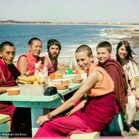 (15853_ng.tif) Group photo by the ocean, Maroochydore, Australia, 1974. The lamas took a day off during the Diamond Valley course to go to the beach in Tom Vichta's van. Everyone got out to enjoy the view from the cliffs, but Lama Yeshe ran straight down to the water's edge, hitched up his robes, and waded in, splashing about with delight.