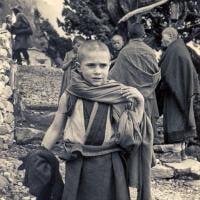 (15860_pr.psd) By 1974, Michael Losang Yeshe (Michael Cassapidis) was nine years old and had spent almost half his life at Kopan Monastery, Nepal. Here he is shown at Lawudo Retreat Center, Nepal.