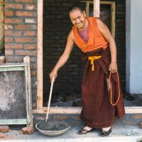 (15864_sl.tif) Lama Yeshe mixing cement for ongoing construction projects at Kopan Monastery, Nepal, 1974.