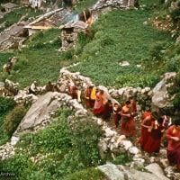 (15867_sl.psd) Mount Everest Center monks climbing up to Namche Bazaar, Nepal, 1974.