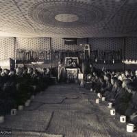 (15882_sl.psd) Photo of the lamas and sangha doing puja in the tent, Kopan Monastery, Nepal, 1974. For the Seventh Meditation Course a huge Indian wedding tent replaced the dusty burlap-walled tent.