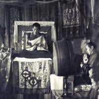 (15884_sl.psd) Photo of the lamas and sangha doing puja in the tent, Kopan Monastery, Nepal, 1974. For the Seventh Meditation Course a huge Indian wedding tent replaced the dusty burlap-walled tent.