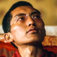 (15891_sl.tif) Lama Zopa Rinpoche teaching in the tent, Kopan Monastery, Nepal, 1974. For the Seventh Meditation Course a huge Indian wedding tent replaced the dusty burlap-walled tent.