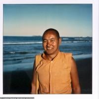 (15927_pr.psd) Lama Yeshe dancing/debating on the beach after the month-long course at Chenrezig Institute, Australia, 1975. Photo by Anila Ann.