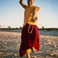 (15929_pr.psd) Lama Yeshe dancing/debating on the beach after the month-long course at Chenrezig Institute, Australia, 1975. Photo by Anila Ann.