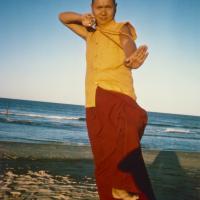 (15930_pr.psd) Lama Yeshe dancing/debating on the beach after the month-long course at Chenrezig Institute, Australia, 1975. Photo by Anila Ann.