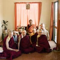 (16744_ng-3.psd) Lama Yeshe with new Sangha at rabjung ordination, Chenrezig Institute, Australia, 1976. From the left: Nigel, unknown woman,  Uldis Balodis (with beard), Charlie Topp (front center), Helen McCallum (Yeshe Dorje), and Tony Duff (right front). Behind Tony is Terry O'Neil. Lama  Yeshe is seated in the back.