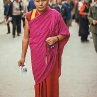 (17321_pr-3.psd) Lama Yeshe in Barkhor Square, Lhasa, Tibet, 1982. Peter Kedge (donor)