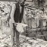 (21881_pr-3.tif) Chowkidhar fixing the exploded septic tank, Kopan Monastery, 1977