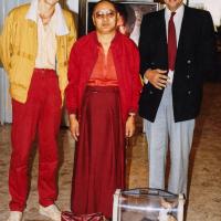 (21993_pr-6.psd) Lama Yeshe at airport with Lama the chuhuahua, Jean Pascal Moret on left and Philippe Pruneta in Vajra Guard uniform, Pisa, Italy, 1982