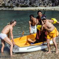 (22162_ng-3.tif) Lama Yeshe on vacation, Ibiza, Spain, 1978. Also in the photo: Paco Hita (father of Osel), Philippe Camus, Tenzin Wangchuk.