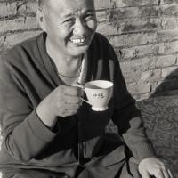 (23233_ng-3.psd) Lama Yeshe having tea at Kopan Monastery, Nepal, 1978.