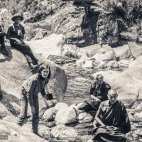 (34018_ud-1.psd) The treking party stops by a river in Kusum on the way to Phagding (half way between Lukla and Namche in Nepal). The party included Lama Yeshe, Lama Zopa Rinpoche, Max Mathews, Zina Rachevsky, Jacqueline Fagan (a New Zealander who had been at Villa Altomont), Judy Weitzner and her husband, Chip Cobalt. Photo donated by Judy Weitzner.