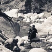 (34019_ud-1.psd) The treking party stops by a river in Kusum on the way to Phagding (half way between Lukla and Namche in Nepal). The party included Lama Yeshe, Lama Zopa Rinpoche, Max Mathews, Zina Rachevsky, Jacqueline Fagan (a New Zealander who had been at Villa Altomont), Judy Weitzner and her husband, Chip Cobalt. Photo donated by Judy Weitzner.