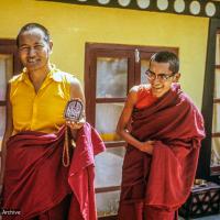 Lama Yeshe and Lama Zopa Rinpoche making Chenrezig tsa tsas on the rooftop at Kopan Monastery, 1973.