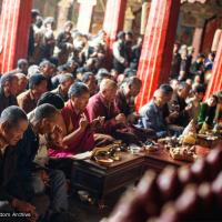 (39513_ud-3.tif) Lama Yeshe at the Jokhang Temple performing Guru Puja, 1982.