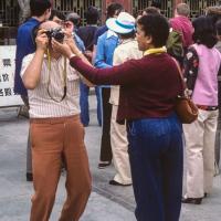 (39528_sl-3.jpg) Lama Yeshe holding camera with Max Mathews on vacation, China, 1982.