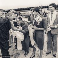 (39544_pr-3.psd) Lama Yeshe greets H.H. 14th Dalai Lama at Barcelona airport in Spain, 1982. With Alberto Vinyoli and Carmen Montagnes of Nagarjuna Barcelona, Puntsog Wangyal on the right.