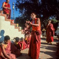 (42183_sl-3.tif) Thubten Sherab debating, Lama Yeshe and Lama Lhundrup looking on, Kopan Monastery, Nepal, 1979.