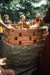 (00652_ud.jpg) Lama Yeshe's body is placed in the cremation stupa. Cremation of Lama Yeshe at Vajrapani Institute, California in March of 1984. Photo includes Jack Morison. Photo by Ricardo de Aratanha.