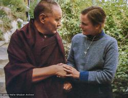 (05379_pr-3.psd) Lama Yeshe with Vicki Mackenzie, Kopan Monastery, Nepal, 1983. Vicki Mackenzie: It was December 1983 after Lama's last  teaching in Kopan, and was taken as he stepped outside the tent, after his last teachings on Bodhicitta.  He was spent, so ill. I took his hands. He asked what he could do for me. I was aghast."No, Lama, what can I do for you?," I replied. Lama thought for a while and said "Give my love to all my brothers and sisters in England."