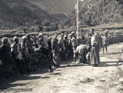 (07651_pr-2.psd) Lama Yeshe on the road to  Lawudo Retreat Centre, Nepal, 1973. Lama Zopa Rinpoche is in the center of this photo.