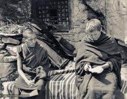 (12501_pr-2.psd) Lama Zopa Rinpoche (left) and Zina Rachevsky outside the cave of the Lawudo Lama. Photo from the first trek to Lawudo Retreat Center in Nepal, spring of 1969. Lawudo was the hermitage of the Lawudo Lama, the former incarnation of Lama Zopa Rinpoche. Photos by George Luneau. (Photo used with permission of the estate of Zina Rachevsky.)