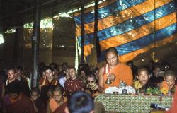 (12753_sl.tif) Lama Yeshe doing puja. Next to Lama Yeshe is Gelek Gyatso, and Charok Lama (Tenzin Dorje). On the left is Thubten Wongmo (Feather Meston), Thubten Pemo (Linda Grossman), Aleca Moriatis, and Nicole Couture. Photo from the 8th Meditation Course at Kopan Monastery, Nepal, 1975.