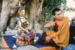 (12912_sl.tif) Lama Zopa Rinpoche painting Tara, Kopan Monastery, Nepal, 1976. Lama Yeshe sent Max Mathews to buy a large Tara statue in Kathmandu, which was eventually placed in a glass-fronted house on a pedestal overlooking a triangular pond that was built under the ancient bodhi tree in front of the gompa, Kopan Monastery, Nepal. Photo by Peter Iseli.