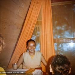 (15070_pr-1.psd) Lama Yeshe with students in an A-frame cabin at Tushita Meditation Center, Dharamsala, India, 1970.