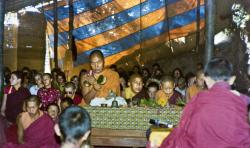 (15601_pr-2.psd) Lama Yeshe doing puja. Next to Lama Yeshe is Gelek Gyatso, Charok Lama (Tenzin Dorje), and Thubten Zopa (Tenzin Norbu). On the left is Thubten Pemo (Linda Grossman), Aleca Moriatis, and Nicole Couture. Photo from the 8th Meditation Course at Kopan Monastery, Nepal, 1975.