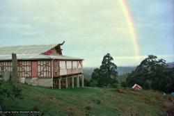 (15921_ng.psd) A rainbow over the gompa (meditation hall), Chenrezig Institute, Australia, 1975