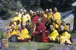 (16746_sl.psd) Ordination group with Lama Yeshe, 1976. Front row: George Churinoff (Karin Valham behind him), Elisabeth Drukier, Dieter Kratzer, (Losang Nyima behind him), Lama Yeshe, Thubten Pende (Jim Dougherty), Steve Malasky (Steve Pearl). Gareth Sparham and Marcel Bertels are behind Pende and Steve. Back row (standing): Margaret McAndrew, Adrian Feldmann (Thubten Gyatso), Scott Brusso, Ursula Bernis, Wendy Finster, unknown tibetan monk, in back Angeles de la Torre, Jeffery Webster, unknown 