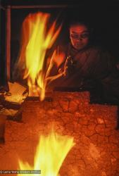 Lama Yeshe performing a fire puja at Tushita Retreat Centre, Dharamsala, India, 1983.