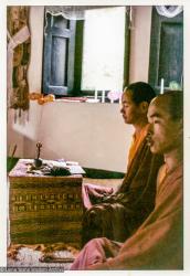 (36901_pr-3.psd) Lama Yeshe doing puja in Zina’s room, Losang Chonjor, right, Kopan Monastery, 1972. Jan Willis (donor-photographer)