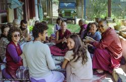 (38344_ng.-3.jpg) Lama Yeshe making chulen pills with students, Tushita Retreat Centre, Dharamsala, India, 1982.