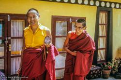 Lama Yeshe and Lama Zopa Rinpoche making Chenrezig tsa tsas on the rooftop at Kopan Monastery, 1973.