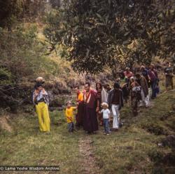 (39287_ng-3.TIF) Lama Yeshe and Lama Zopa Rinpoche walking with students from Diamond Valley to Eudlo land, 1974. Wendy Hobbs (photographer)