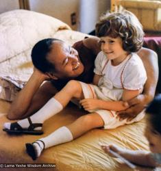 (39383_ud-3.psd) Lama Yeshe and Emily Solick (daughter of Robbie and Randa), 1978. Robbie Solick (photographer)