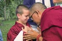 Lama Zopa Rinpoche visiting Chenrezig Institute with Osel, 1991. Photo by Thubten Yeshe. 